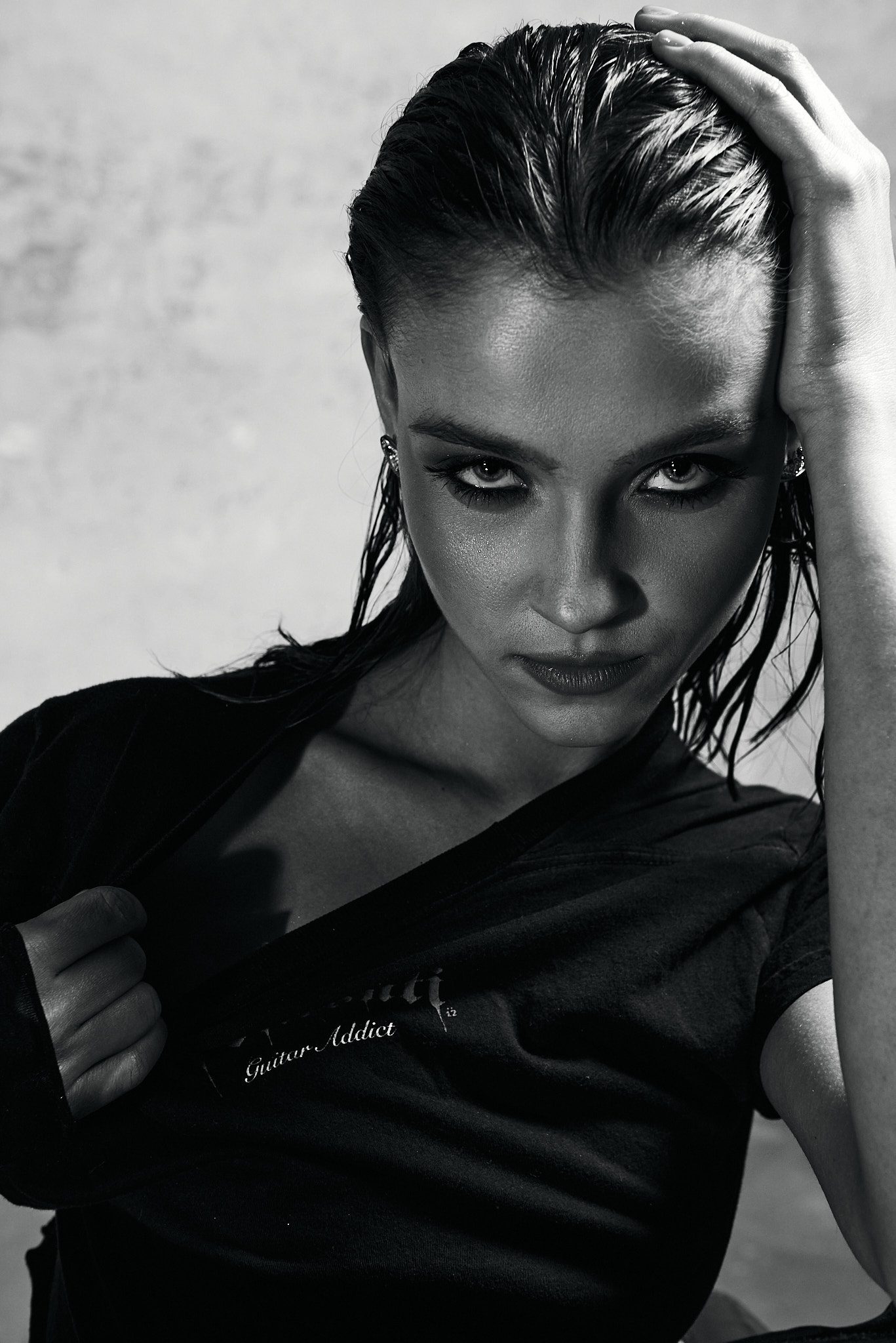 female model wet hair intense look black and white beauty