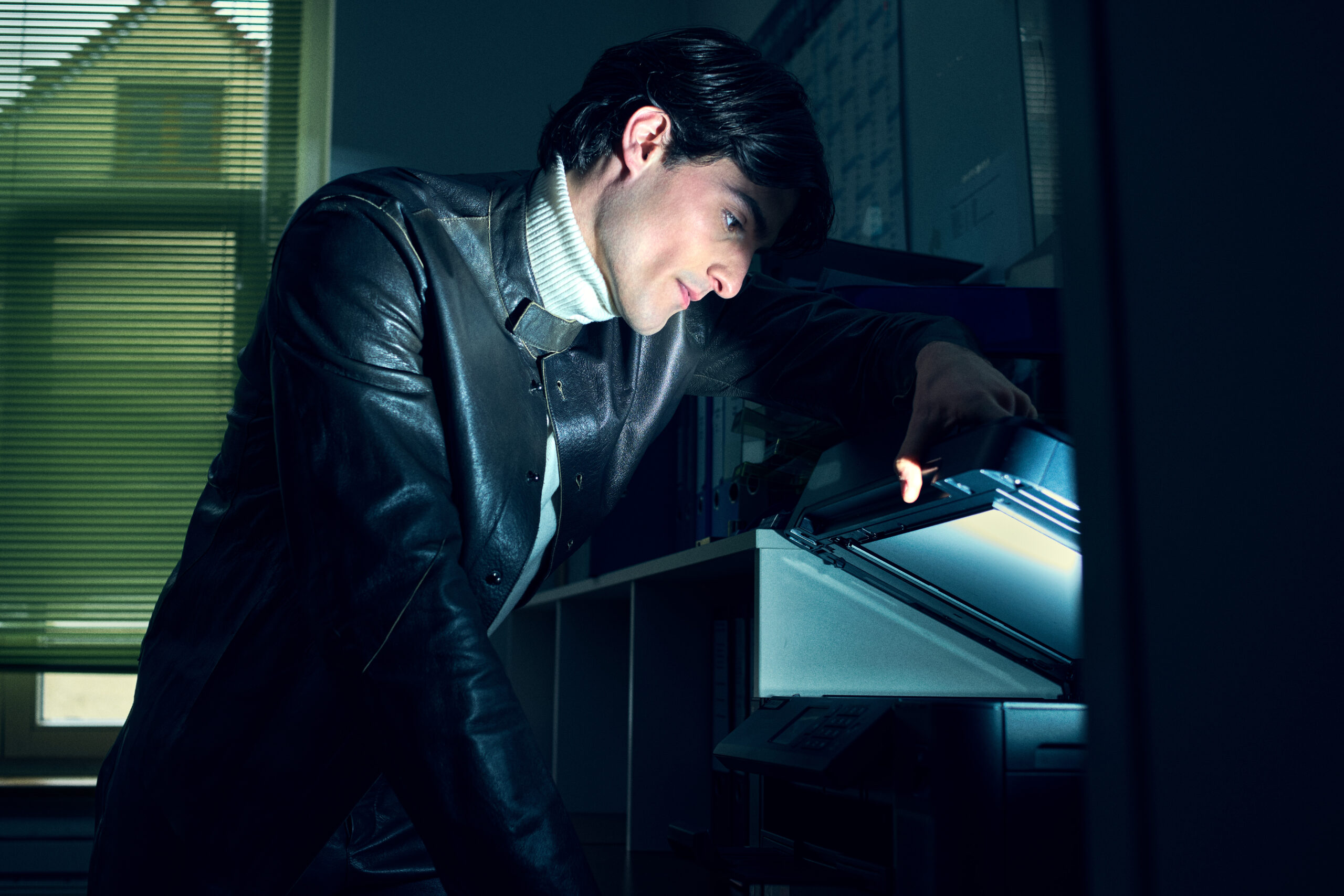 male model office night cinematic lighting printer scene fashion editorial